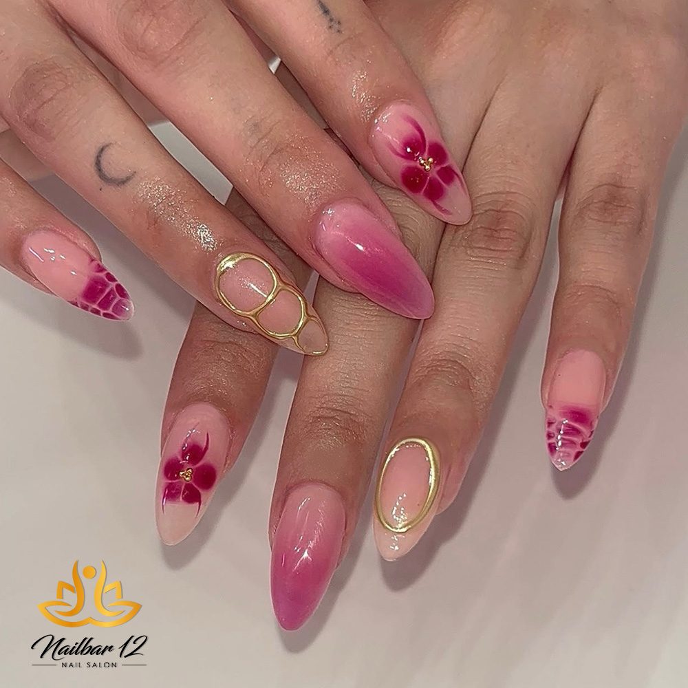 Micro-French tips and chrome detail on a manicure at Nail Bar 12